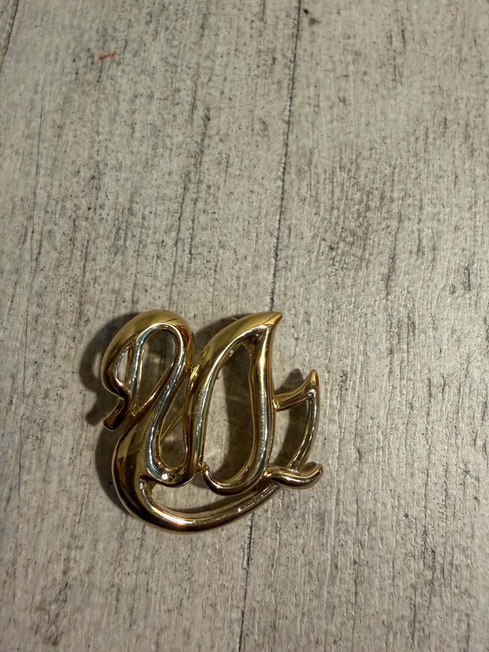 Trifari Shiny Gold Script Monogram Brooch